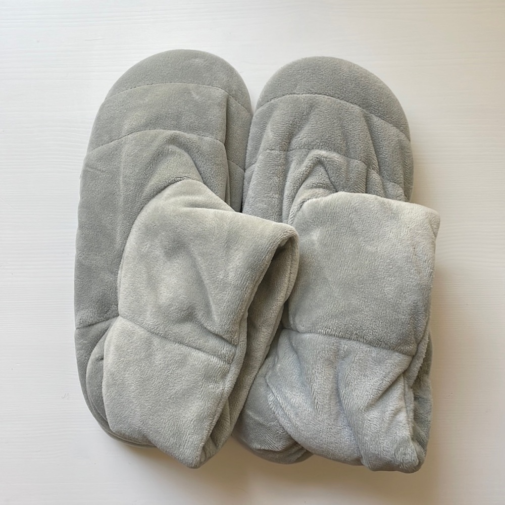 Gray vibrating slipper booties.